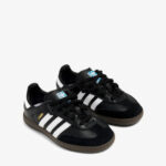 Pair of black Adidas Samba sneakers with white stripes and brown soles, shown side-by-side.