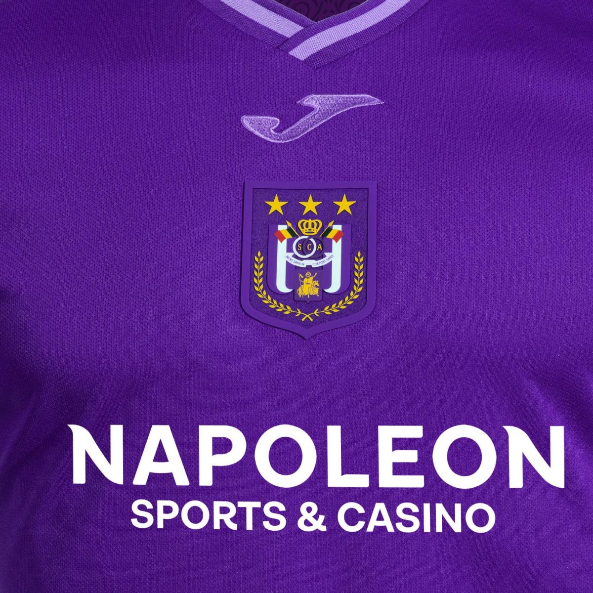 Purple sports jersey with a white Joma logo, crest emblem, and large white 'NAPOLEON' text at the bottom.
