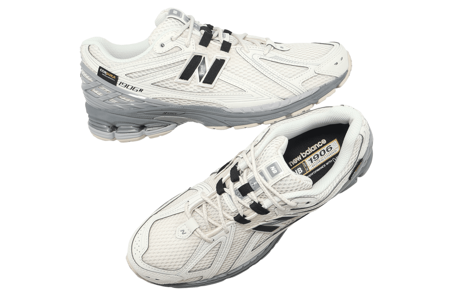ipad_new-balance-1906r-beige-black-5 | UAE SPORT STORE Two New Balance running shoes in white and light gray with mesh uppers, shown from top and side.