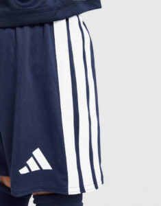 Navy athletic shorts with white side stripes and Adidas logo near the hem.