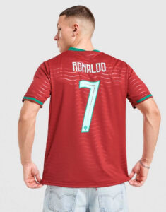 jd_778217_a | UAE SPORT STORE Back view of a person in a red soccer jersey with the name 'RONALDO' and number 7 on the back.