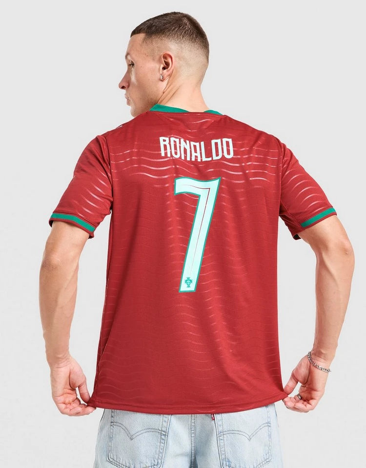 jd_778217_a | UAE SPORT STORE Back view of a person in a red soccer jersey with the name 'RONALDO' and number 7 on the back.