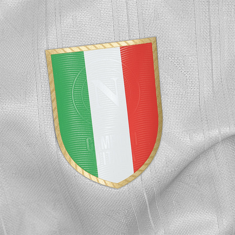 kc | UAE SPORT STORE Gold-bordered shield featuring the Italian tricolor (green, white, red) on a metallic silver fabric background, as a patch or emblem