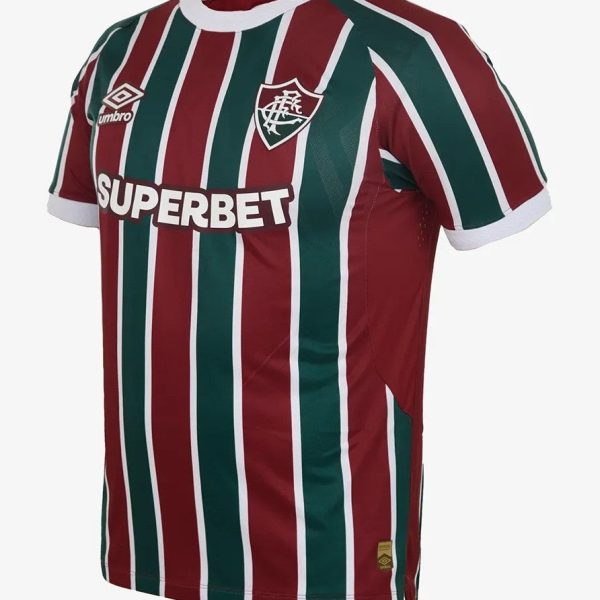 Soccer jersey with vertical maroon and green stripes, white trim, sponsor 'SUPERBET' across the chest and Umbro logo on the shoulder.