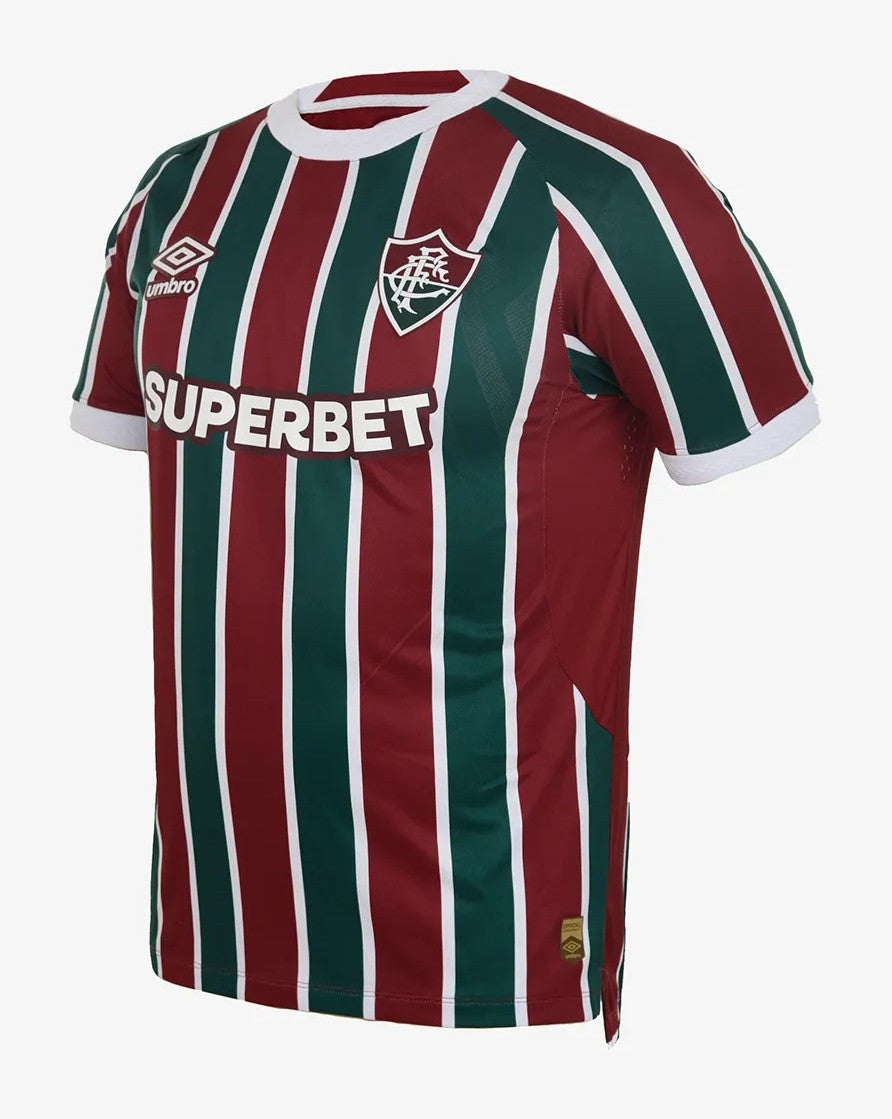lMFo3kgvgGkIgyZ | UAE SPORT STORE Soccer jersey with vertical maroon and green stripes, white trim, sponsor 'SUPERBET' across the chest and Umbro logo on the shoulder.