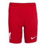 Red athletic shorts with an elastic waistband, featuring the Liverpool FC crest on the left leg and a white Nike swoosh on the right leg.