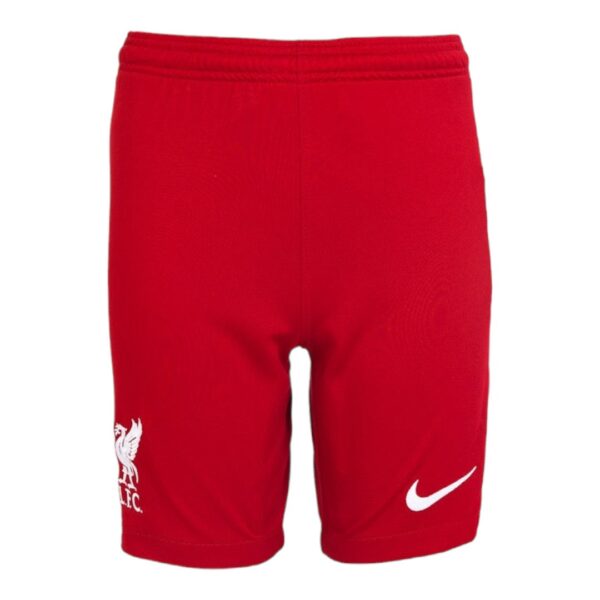 Red athletic shorts with an elastic waistband, featuring the Liverpool FC crest on the left leg and a white Nike swoosh on the right leg.