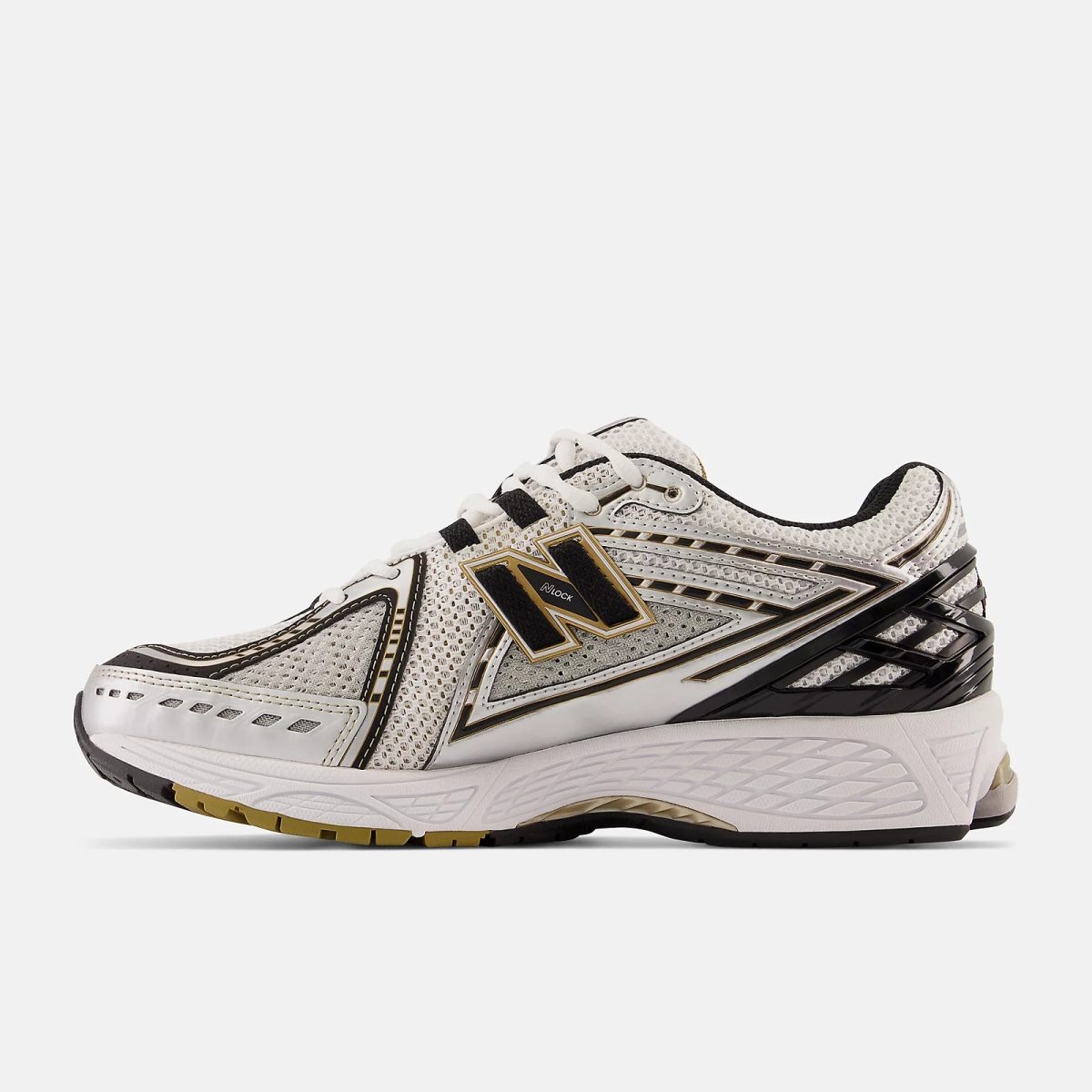 White athletic running shoe with gold and black accents, mesh upper and cushioned midsole (side view).
