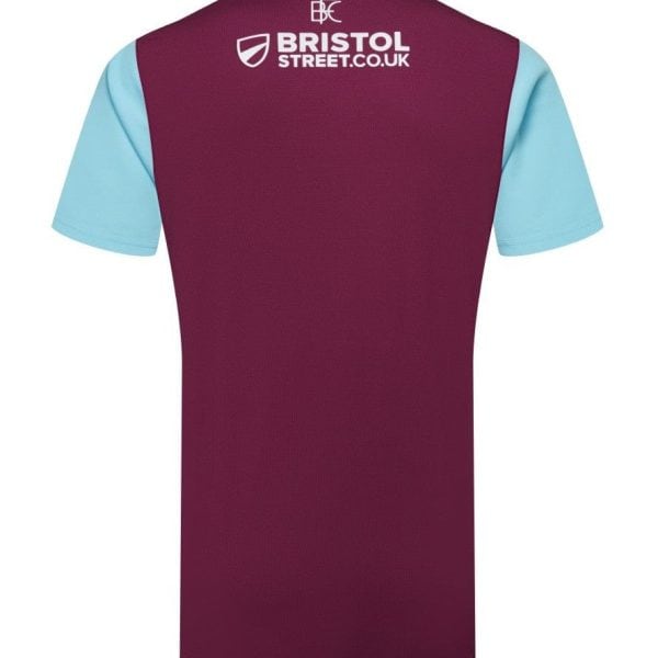 Back view of a maroon short-sleeve sports jersey with light blue sleeves and the Bristol Street logo on the upper back
