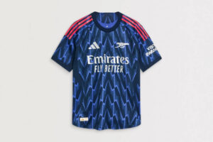 Blue zigzag-pattern Arsenal away jersey with Emirates Fly Better sponsor and Adidas logo on the chest
