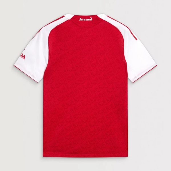 Back view of red Arsenal football jersey with white sleeves and 'Arsenal' logo at the neck.