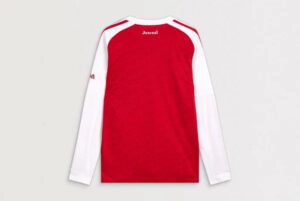 mji9536_b1 | UAE SPORT STORE Back view of a red Arsenal long-sleeve soccer jersey with white sleeves and the Arsenal branding at the neck area