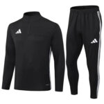 Black Adidas tracksuit set: long-sleeve pullover with half-zip and matching joggers with white stripes along the sides.