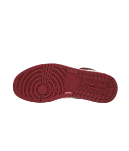 Red sneaker sole with circular tread pattern and a small Nike logo along the midsole edge, viewed from below in red.