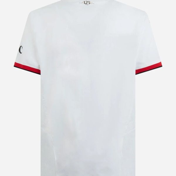 Back view of a white polo shirt with red and black trim on the collar and sleeve cuffs; small gold text at the neck.