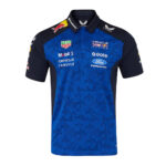 Blue and navy Red Bull Racing polo shirt with sponsor logos on the chest and sleeves, designed for racing team apparel.