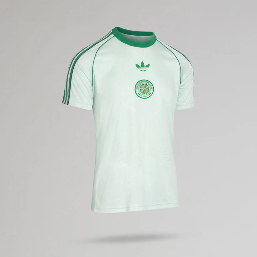 p-12932-c | UAE SPORT STORE Light mint-green Adidas football jersey with dark green collar, three stripes on the sleeves, and a circular club crest on the chest