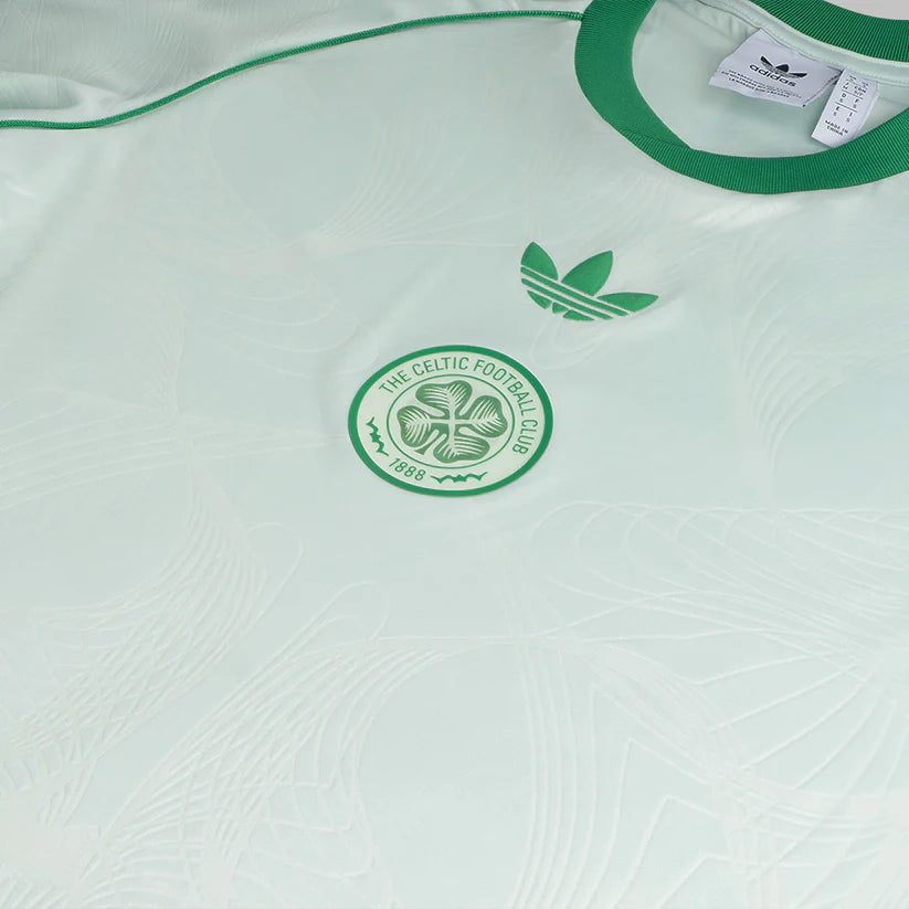 p-12932-e | UAE SPORT STORE Mint-green Celtic Football Club jersey with Adidas logo and club crest.