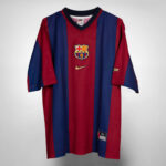 FC Barcelona soccer jersey with blue and maroon vertical stripes, crest on the chest, and Nike swoosh.