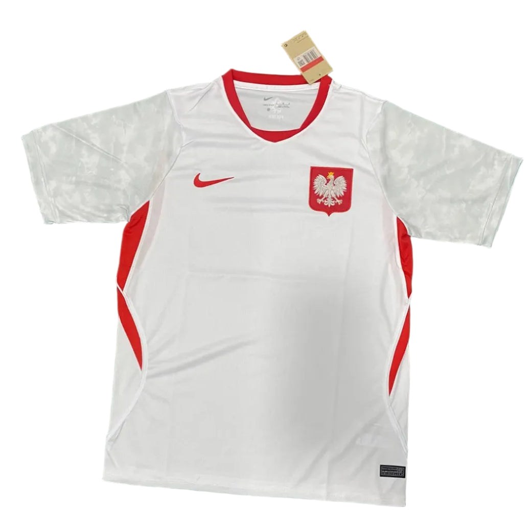 pploo-qc-poland-2026-world-cup-home-kit-v0-pxjq02xomrsg1 White Poland national football jersey with red collar, red side panels, Nike swoosh, and white eagle crest on the chest.