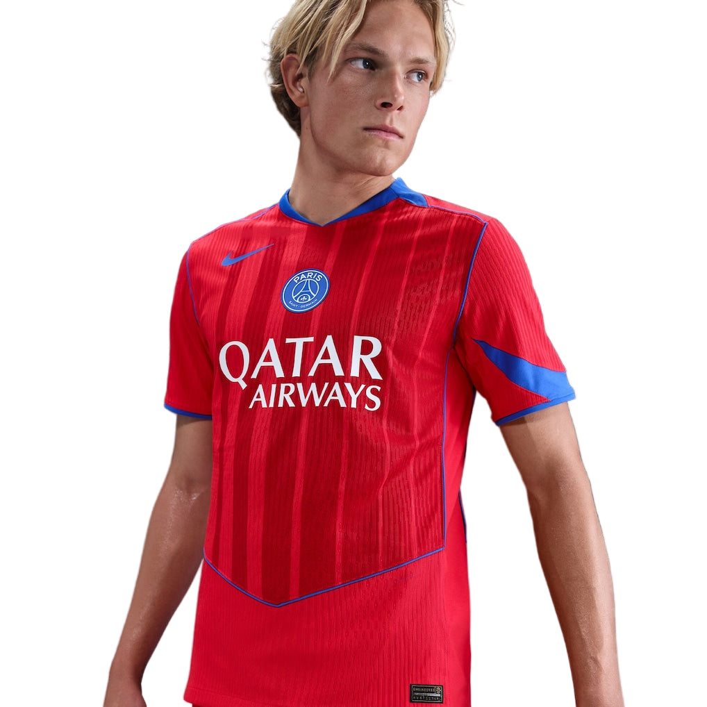 psg-nike-third-dri-fit-adv-match-shirt-2025-26_ss5_p-202664110_pv-5_u-unftcnjonzqpfl09vwqn_v-0jywj4oo8eenxjhnexwg Young man wearing a red Paris Saint-Germain jersey with Qatar Airways sponsor.