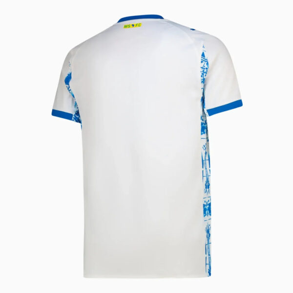 Back view of a white soccer jersey with blue collar trim and blue side panels with abstract graphic pattern on the right side.