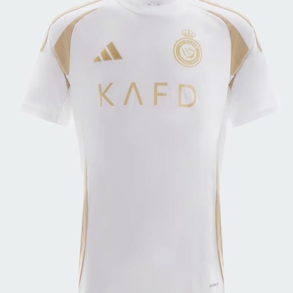 White football jersey with gold accents, Adidas logo on the right, and a gold club crest on the left chest, featuring 'KAFD' across the front.