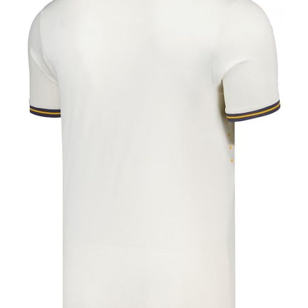 Back view of a white short-sleeve polo shirt with purple and yellow trim on the collar and sleeves.