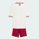 r4 | UAE SPORT STORE Back view of a white sports jersey with maroon and gold striped collar and sleeve cuffs, a small crest on the upper back, paired with red shorts.