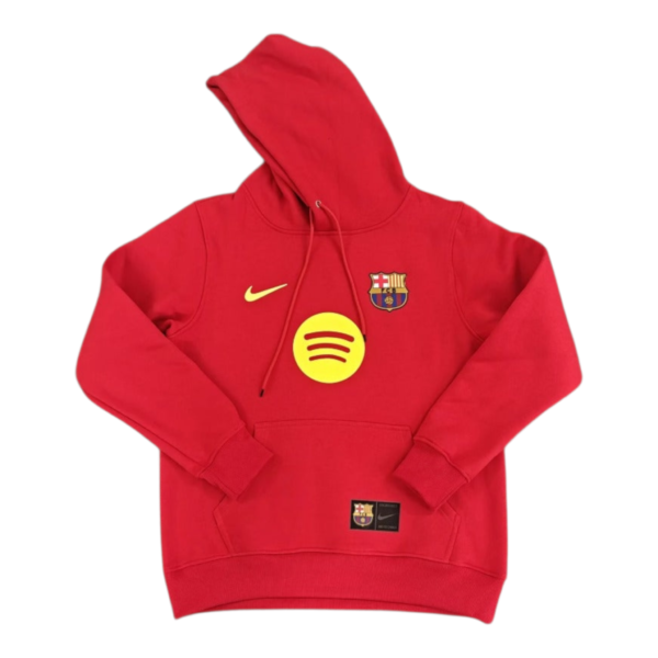 Red hoodie featuring the FC Barcelona crest, a yellow Nike swoosh, and a Spotify logo on the chest area.