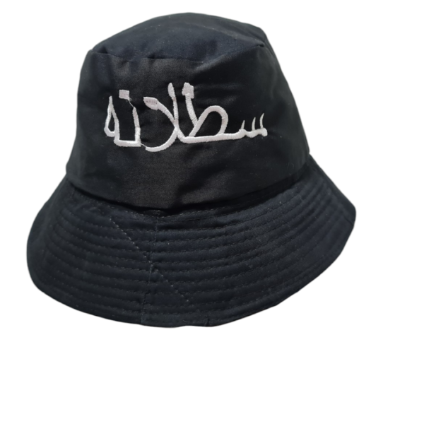 Black bucket hat with white embroidered script on the front.