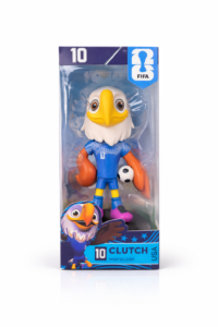 Toy figure of a white eagle in a blue soccer kit, standing with a soccer ball inside clear packaging.