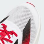 rn-image_picker_lib_temp_2705b000-fa27-48c2-9e7e-dd7f5f9921aa | UAE SPORT STORE Close-up of a white mesh sneaker with red laces and a black Nike swoosh