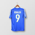 rn-image_picker_lib_temp_2a359fe7-89f0-4876-b7d9-73b720ef147c | UAE SPORT STORE Blue Ronaldo #9 soccer jersey on a hanger, back view with name and number visible