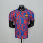 Black mannequin torso wearing a blue and red FC Barcelona jersey on a stand, headless.