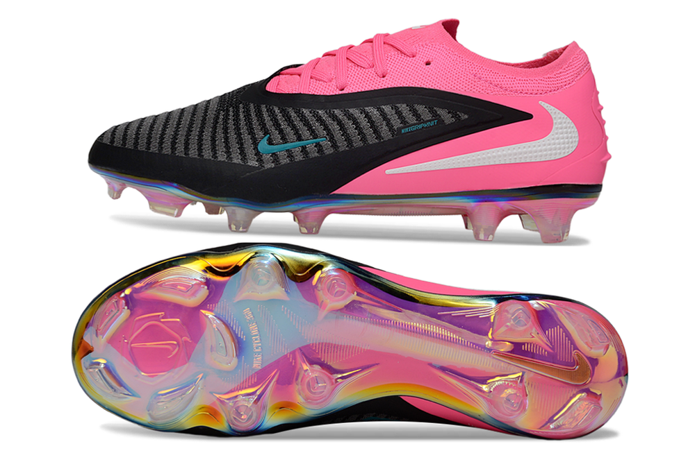 rn-image_picker_lib_temp_37b080cf-55ba-496b-87d5-92ecfc7c1f54 | UAE SPORT STORE Nike soccer cleat with pink heel, black striped upper, light blue swoosh, and iridescent outsole shown from side and bottom (product image).
