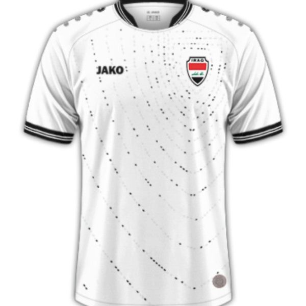 White soccer jersey with black dotted swirl pattern, JAKO logo left chest and a team crest on right chest, black striped cuffs and collar edge.