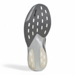 rn-image_picker_lib_temp_4087a5c9-d45f-415f-ac45-d3f856b813d4 | UAE SPORT STORE Bottom view of a gray athletic shoe sole with white rectangular traction pods and a cushioned heel area.