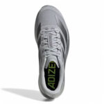 rn-image_picker_lib_temp_505f5b6a-20e4-446a-bb1b-890c99bb5625 | UAE SPORT STORE Top-down view of a light gray Adidas Adizero running shoe with white laces; black insole shows lime-green 'ADIZERO' branding.
