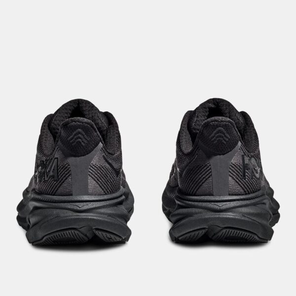 Two black running shoes viewed from the back, showing padded heels and chunky soles on a light background.