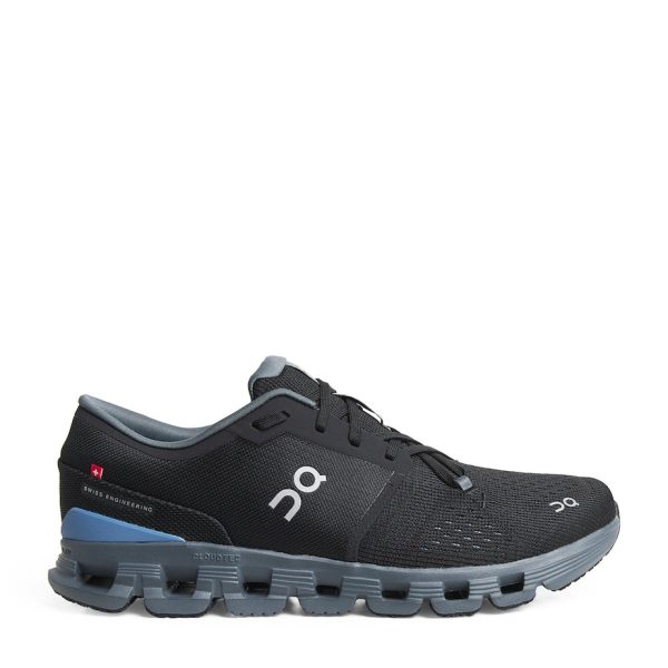 Black and gray athletic running shoe with blue heel counter and On logo on the side, shown in profile.