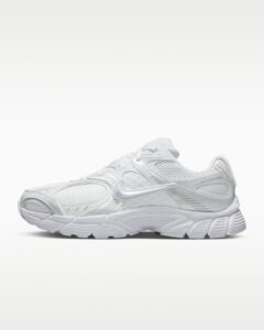 rn-image_picker_lib_temp_7660ab45-1431-4dee-a533-858ee45c2b06 | UAE SPORT STORE White athletic sneaker with mesh panels and chunky sole, viewed from the side on a white background