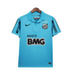 Light blue soccer jersey on hanger featuring Banco BMG sponsor and club crest on chest, with Nike swoosh and Jokers on sleeves (fashion/merch item).