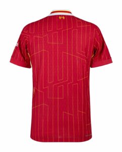 Back view of a red polo shirt with a slim yellow geometric line pattern and a striped white collar with red and yellow accents.