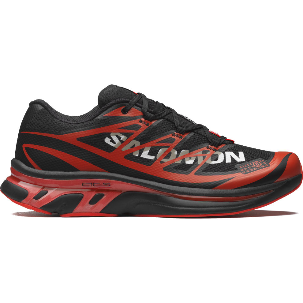 rn-image_picker_lib_temp_875c0fca-ee7f-47d0-8865-af93c2f75d2f | UAE SPORT STORE Black and red running shoe with a bold Salomon logo on the side, side view.