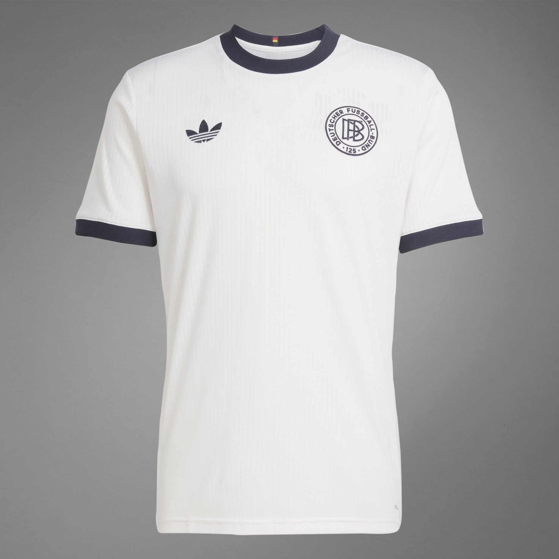 rn-image_picker_lib_temp_921dd33a-44fc-47fa-a8c5-d69287515123 | UAE SPORT STORE White polo shirt with navy ribbed collar and cuffs, Adidas trefoil logo on left chest and a circular crest on the right reading 'Deutscher Fussball-Bund' (Germany)