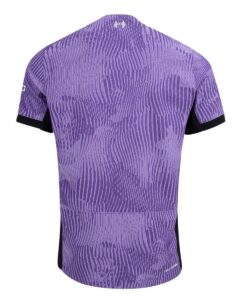 rn-image_picker_lib_temp_97184531-9639-4b0b-b36d-2952b38303cb | UAE SPORT STORE Back view of a purple camouflage-pattern cycling jersey with black sleeve cuffs and subtle vertical texture