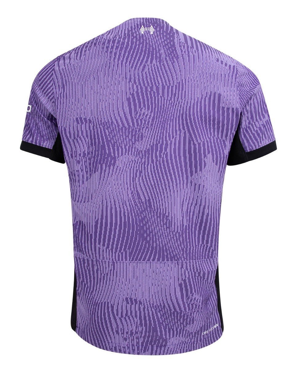 rn-image_picker_lib_temp_97184531-9639-4b0b-b36d-2952b38303cb | UAE SPORT STORE Back view of a purple camouflage-pattern cycling jersey with black sleeve cuffs and subtle vertical texture