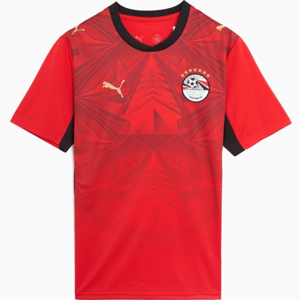 Red short-sleeve soccer jersey with black collar, features geometric pattern and the Egyptian Football Association crest on the chest, plus a gold Puma logo on the opposite shoulder.