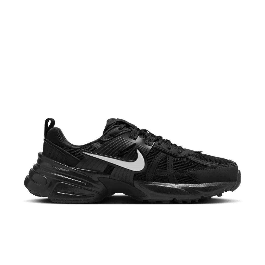 rn-image_picker_lib_temp_ac3dbfca-523b-4052-9016-c33295752b35 | UAE SPORT STORE Black Nike running shoe with a white Swoosh on the side and a chunky sole in black.